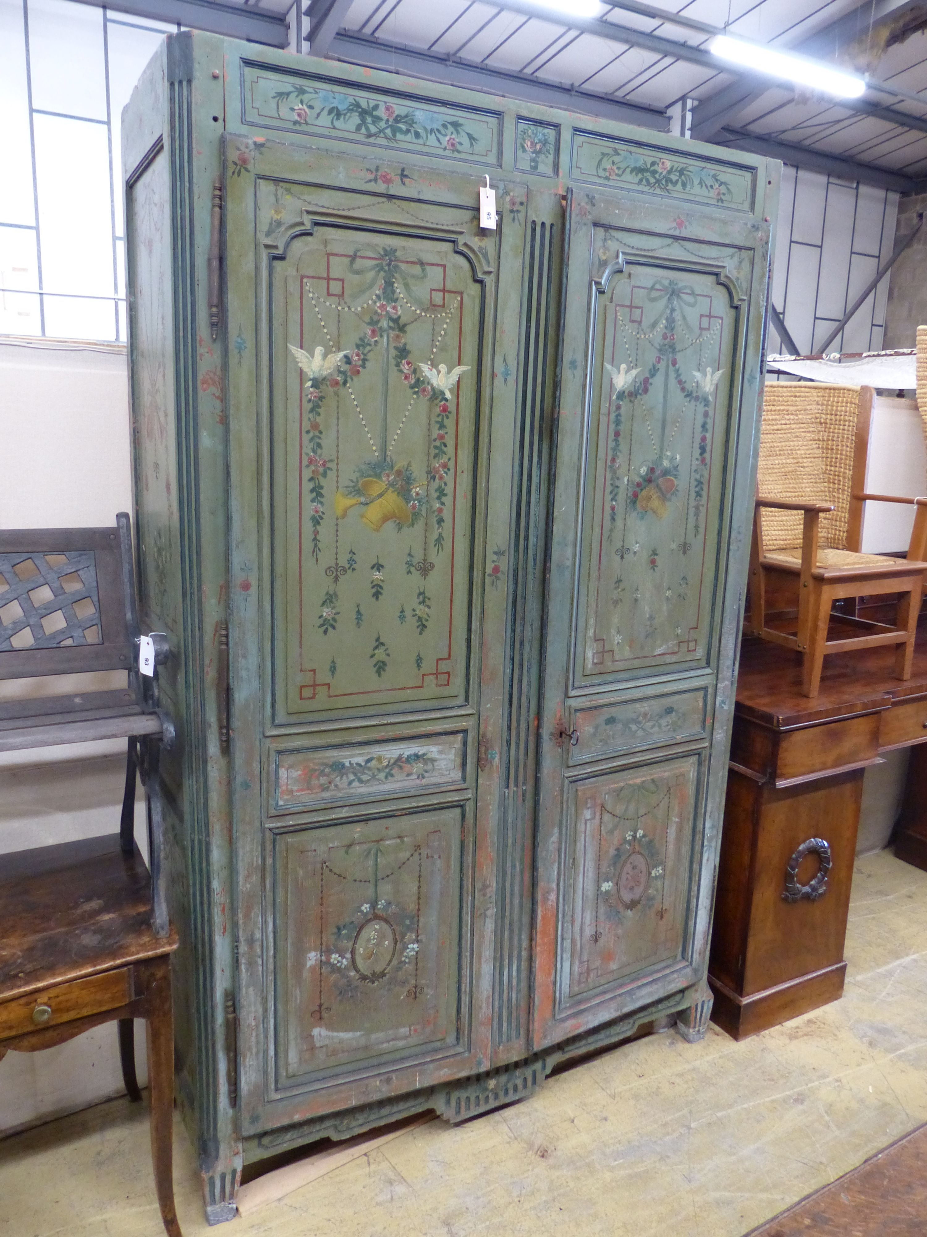 An 18th / early 19th century French later painted armoire, length 140cm, depth 50cm, height 227cm